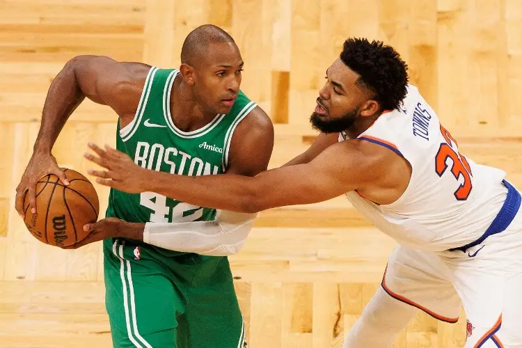 Los Boston Celtics estrenan su título con una victoria en el regreso de la NBA